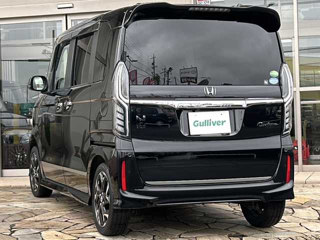 ホンダ Ｎ ＢＯＸ カスタム G EX ターボ ホンダセンシング 静岡県 2018(平30)年 4.6万km クリスタルブラックパール 純正8インチナビ/Bluetooth/CD/DVD/フルセグTV/両側パワースライドドア/スマートキー/LEDヘッドライト/バックカメラ/ドライブレコーダー/アダプティブ・クルーズ・コントロール（ACC）/・作動車速域：約30km/hから100km/h間/車線維持支援システム（LKAS）/・作動車速：約65km/hから100km/h間/・ステアリング制御/衝突軽減ブレーキ（CMBS）/・歩行者検知機能/・作動車速：約80km/h未満時/・対向車車速：約30km/hから80km/h時/誤発進抑制機能（前進）/・ミリ波レーダー検知：作動車速10km/h未満/歩行者事故低減ステアリング/・作動車速10km/hから40km/h間/路外逸脱抑制機能/・作動車速：約60km/hから100km/h間/先行車発進お知らせ機能/標識認識機能/オートハイビーム/誤発進抑制機能（後進）・ソナー検知：作動車速10km/h未満