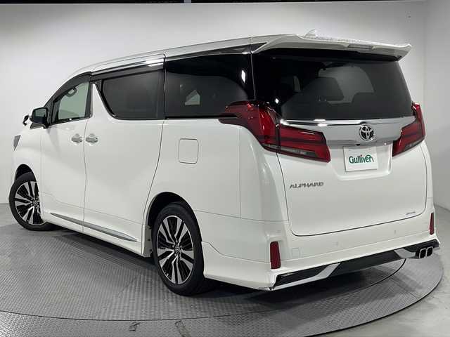 トヨタ アルファード S Cパッケージ 広島県 2022(令4)年 1.5万km ホワイトパールクリスタルシャイン モデリスタフルエアロ/ツインムーンルーフ/純正9型ディスプレイオーディオ/3眼LEDヘッドライト/パワーシート/シートヒーター/ベンチレーション/ステアリングヒーター/両側パワースライドドア/パワーオットマン/パワーバックドア/バックカメラ/クリアランスソナー/セーフティセンス/・プリクラッシュセーフティ/・レーントレーシングアシスト/・アダプティブハイビーム/・レーダークルーズコントロール/純正18インチAW/ETC/ドライブレコーダー