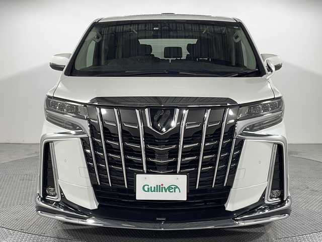 トヨタ アルファード S Cパッケージ 広島県 2022(令4)年 1.5万km ホワイトパールクリスタルシャイン モデリスタフルエアロ/ツインムーンルーフ/純正9型ディスプレイオーディオ/3眼LEDヘッドライト/パワーシート/シートヒーター/ベンチレーション/ステアリングヒーター/両側パワースライドドア/パワーオットマン/パワーバックドア/バックカメラ/クリアランスソナー/セーフティセンス/・プリクラッシュセーフティ/・レーントレーシングアシスト/・アダプティブハイビーム/・レーダークルーズコントロール/純正18インチAW/ETC/ドライブレコーダー