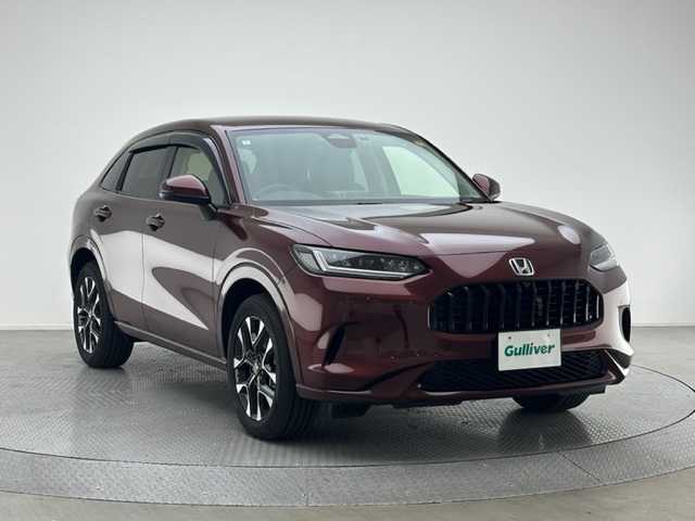 ホンダ ＺＲ－Ｖ ハイブリッド e:HEV Z 兵庫県 2024(令6)年 0.4万km アーバンチタニウムメタリック 純正メモリナビ/（フルセグ、Bluetooth、USB）/純正９インチDA/（BOSEサウンド、スマートフォン連携）/前後ドラレコ/パドルシフト/ACC/LKA/PCS/BSM/コーナーセンサー/後退出庫サポート/ビルトインETC２．０/ワイヤレス充電/レザーシート/パワーシート/シートヒーター/ステアリングヒーター/パワーバックドア/LEDヘッドライト/純正ラバーバイザー/スペアキー１個/純正AW