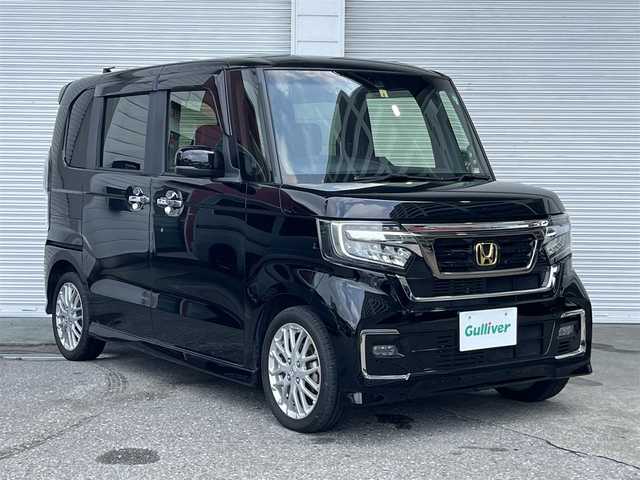 ホンダ Ｎ ＢＯＸ カスタム L ターボ 高知県 2022(令4)年 2.4万km クリスタルブラックパール 純正ナビ/　Bluetooth/フルセグ/　CD/DVD/AM/FM/ワンオーナー/ターボ/ホンダセンシング/バックカメラ/両側パワースライドドア/クルーズコントロール/LEDヘッドライト/純正15インチアルミホイール/純正フロアマット/プッシュスタート/スマートキー/コーナーセンサー/シートヒーター/ハーフレザーシート/ベンチシート/アイドリングストップ/MTモード付AT/TVキャンセラー/本革巻きステアリング/衝突被害軽減システム/オートマチックハイビーム/オートライト/横滑り防止装置/盗難防止装置