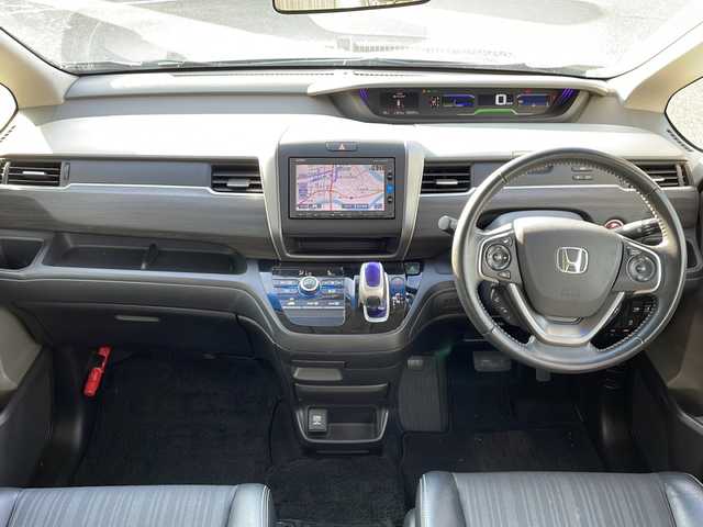 ホンダ フリード ハイブリット G ホンダセンシング 新潟県 2016(平28)年 5.2万km ブルーホライゾンM 社外メモリナビ/（BT／AM／FM／DVD）/バックカメラ/フルセグTV/ステアリングスイッチ/片側電動自動ドア（左）/ビルトインETC/クルーズコントロール/衝突軽減システム/レーンキープアシスト/LEDヘッドライト/オートライト/ドアバイザー/シガーソケット/スマートキー