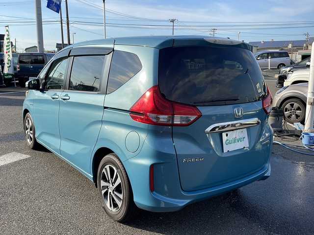 ホンダ フリード ハイブリット G ホンダセンシング 新潟県 2016(平28)年 5.2万km ブルーホライゾンM 社外メモリナビ/（BT／AM／FM／DVD）/バックカメラ/フルセグTV/ステアリングスイッチ/片側電動自動ドア（左）/ビルトインETC/クルーズコントロール/衝突軽減システム/レーンキープアシスト/LEDヘッドライト/オートライト/ドアバイザー/シガーソケット/スマートキー
