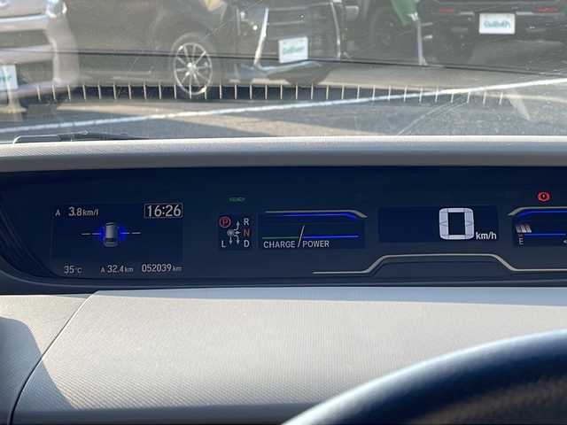 ホンダ フリード ハイブリット G ホンダセンシング 新潟県 2016(平28)年 5.2万km ブルーホライゾンM 社外メモリナビ/（BT／AM／FM／DVD）/バックカメラ/フルセグTV/ステアリングスイッチ/片側電動自動ドア（左）/ビルトインETC/クルーズコントロール/衝突軽減システム/レーンキープアシスト/LEDヘッドライト/オートライト/ドアバイザー/シガーソケット/スマートキー