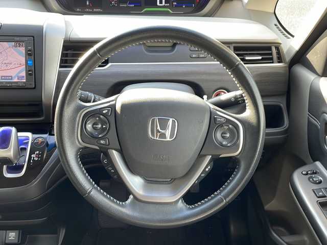 ホンダ フリード ハイブリット G ホンダセンシング 新潟県 2016(平28)年 5.2万km ブルーホライゾンM 社外メモリナビ/（BT／AM／FM／DVD）/バックカメラ/フルセグTV/ステアリングスイッチ/片側電動自動ドア（左）/ビルトインETC/クルーズコントロール/衝突軽減システム/レーンキープアシスト/LEDヘッドライト/オートライト/ドアバイザー/シガーソケット/スマートキー