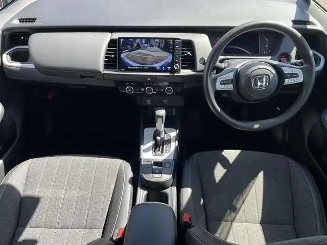 ホンダ フィット ホーム 長野県 2022(令4)年 1.6万km プレミアムサンライトホワイトパール ワンオーナー/純正ナビ/・Bluetooth/TV/CD/DVD/フロントカメラ/バックカメラ/純正ETC/クルーズコントロール追走あり/純正ドライブレコーダー前後/ハーフレザーシート/純正フロアマット/社外15インチAW/LEDオートライト/純正ドアバイザー/スペアキー1本/取り扱い説明書/保証書
