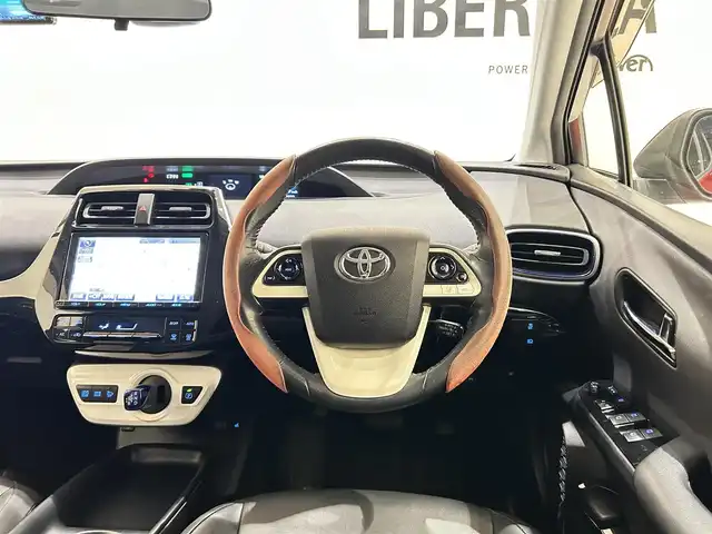 トヨタ プリウス S ツーリングセレクション 福岡県 2016(平28)年 4.9万km エモーショナルレッド 黒合皮　/純正ナビ／ＴＶ　/Ｂカメラ　/Ｂｌｕｅｔｏｏｔｈ　/クルーズコントロール　/シートヒーター　/オートライト　/純正１７インチＡＷ　/ＥＴＣ　/スマートキー