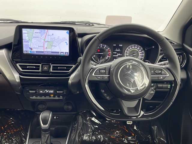 スズキ フロンクス 秋田県 2024(令6)年 0.1千km パールⅡ 4WD/純正メモリナビ　/Bluetooth/AM/FM/AppleCarPlay/AndroidAuto/全方位カメラ　/デュアルセンサーブレーキサポートII　/レーダークルーズコントロール　/パドルシフト　/レーンキープアシスト/横滑り防止装置/アイドリングストップ/ヘッドアップディスプレイ/前席シートヒーター　/LEDヘッドライト　/フォグランプ/USBポート　/スペアキー/電動パーキング/オートホールド/ヒルディセントコントロール/ダウンヒルアシスト/ステアリングスイッチ/純正アルミホイール