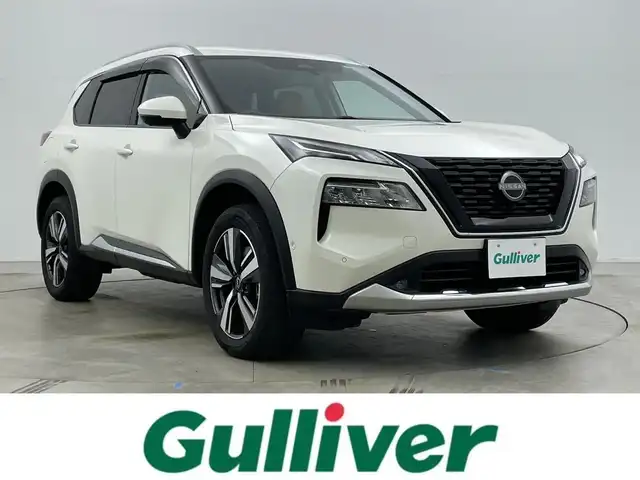 日産 エクストレイル G e－4ORCE 岡山県 2023(令5)年 2.3万km ブリリアントホワイトパール 12.3インチナビ/地デジ/Bluetooth/USB/AppleCarPlay/アラウンドビューモニター/レザーシート/シートヒーター /ビルトインETC2.0/プロパイロット /置くだけ充電/ヘッドアップディスプレイ/ブラインドスポットモニター/パワーシート /パワーバックドア /エマージェンシーブレーキ/プッシュスタート /スマートキー/パーキングアシスト/AC100V電源/インテリジェントルームミラー/純正フロアマット/純正19インチアルミホイール/新車保証書