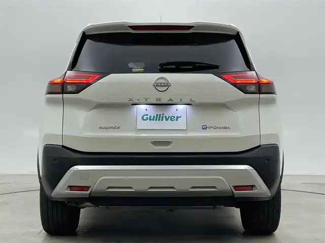 日産 エクストレイル G e－4ORCE 岡山県 2023(令5)年 2.3万km ブリリアントホワイトパール 12.3インチナビ/地デジ/Bluetooth/USB/AppleCarPlay/アラウンドビューモニター/レザーシート/シートヒーター /ビルトインETC2.0/プロパイロット /置くだけ充電/ヘッドアップディスプレイ/ブラインドスポットモニター/パワーシート /パワーバックドア /エマージェンシーブレーキ/プッシュスタート /スマートキー/パーキングアシスト/AC100V電源/インテリジェントルームミラー/純正フロアマット/純正19インチアルミホイール/新車保証書