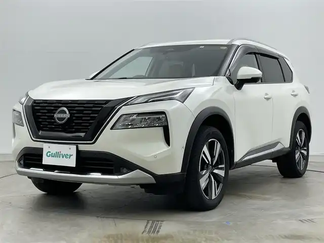 日産 エクストレイル G e－4ORCE 岡山県 2023(令5)年 2.3万km ブリリアントホワイトパール 12.3インチナビ/地デジ/Bluetooth/USB/AppleCarPlay/アラウンドビューモニター/レザーシート/シートヒーター /ビルトインETC2.0/プロパイロット /置くだけ充電/ヘッドアップディスプレイ/ブラインドスポットモニター/パワーシート /パワーバックドア /エマージェンシーブレーキ/プッシュスタート /スマートキー/パーキングアシスト/AC100V電源/インテリジェントルームミラー/純正フロアマット/純正19インチアルミホイール/新車保証書