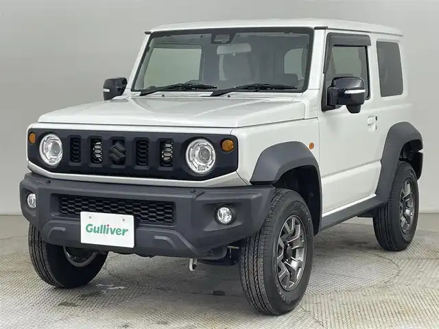 スズキ ジムニー シエラ JC 道央・札幌 2020(令2)年 4.1万km ピュアホワイトパール ・ワンオーナー/・４WD/・リフトアップ/・純正8インチナビ/　CD/DVD/SD/BT/フルセグ/・バックカメラ/・ビルトインETC/・アイドリングストップ/・衝突軽減ブレーキ/・クルーズコントロール/・レーンキープアシスト/・前席シートヒーター/・シートカバー/・LEDヘッドライト/・フォグライト/・オートライト/・プッシュスタート/・スマートキー/・純正AW