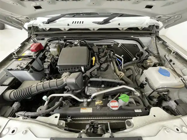 スズキ ジムニー シエラ JC 道央・札幌 2020(令2)年 4.1万km ピュアホワイトパール ・ワンオーナー/・４WD/・リフトアップ/・純正8インチナビ/　CD/DVD/SD/BT/フルセグ/・バックカメラ/・ビルトインETC/・アイドリングストップ/・衝突軽減ブレーキ/・クルーズコントロール/・レーンキープアシスト/・前席シートヒーター/・シートカバー/・LEDヘッドライト/・フォグライト/・オートライト/・プッシュスタート/・スマートキー/・純正AW