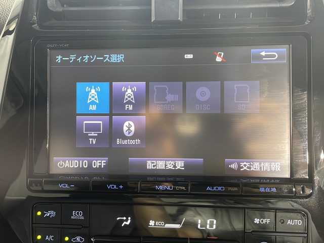 トヨタ プリウス A ツーリングセレクション 沖縄県 2016(平28)年 7.4万km スティールブロンドM ・県外仕入/・禁煙車/・純正9インチナビ（フルセグTV CD FM AM BT）/・Toyota Safety Sense/・プリクラッシュセーフティ/・レーンディパーチャーアラート/・オートマチックハイビーム/・ブレーキ制御付きレーダークルーズコントロール/・インテリジェントクリアランスソナー/・ヘッドアップディスプレイ/・前後ドライブレコーダー/・ステアリングリモコン/・レザーシート/・シートヒーター/・オールオートパワーウィンドウ/・ETC/・プッシュスタート/・スマートキー/・純正アルミホイール/・純正フロアマット/・純正ドアバイザー