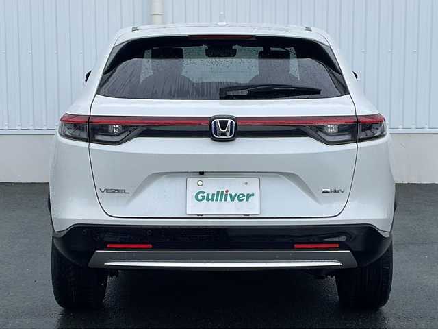 ホンダ ヴェゼル ハイブリッド e:HEV Z 三重県 2023(令5)年 1.6万km プラチナホワイトパール 禁煙車　/衝突軽減　/純正９型ナビ　/フルセグＴＶ　/バックカメラ　/レーダークルーズ　/レーンキープアシスト　/ステアリングヒーター　/シートヒーター　/パワーバックドア　/パドルシフト　/置くだけ充電　/USB充電/ブレーキホールド/ブラインドスポットモニター/フロントデアイサー