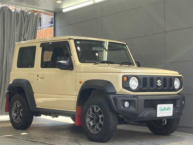 スズキ ジムニー シエラ JC 東京都 2022(令4)年 2.2万km シフォンアイボリーM セーフティサポート/・デュアルセンサーブレーキサポート/・誤発進抑制機能/・車線逸脱警告機能/・ふらつき警告機能/・先行車発進お知らせ機能/・標識認識機能/・ハイビームアシスト/ディスプレイオーディオ/バックカメラ/クルーズコントロール/プッシュスタート/背面タイヤ/LEDヘッドライト・フォグランプ/ビルトインETC/AppleCarPlay ・AndroidAuto/シートヒーター /デジタルインナーミラー/ドライブレコーダー前後/カロッツェリアスピーカー/電動格納ミラー/保証書・取扱説明書