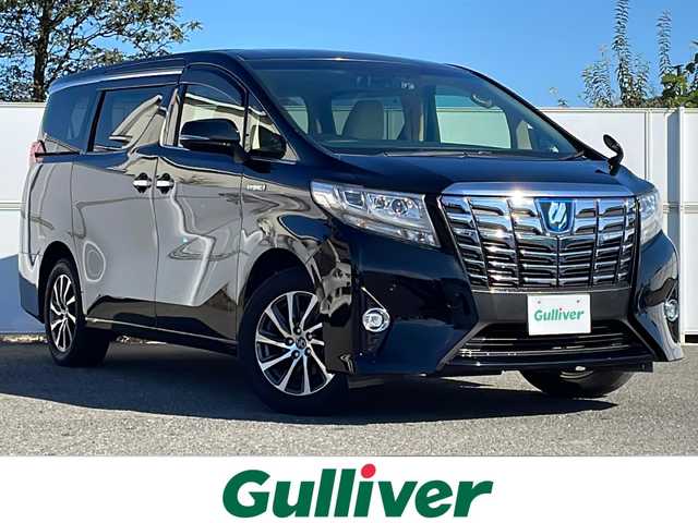 トヨタ アルファードハイブリット G 道東・釧路十勝 2015(平27)年 8.7万km ブラック １０型アルパインナビ　フリップダウンモニター　ＣＤ／ＤＶＤ再生　Ｂｌｕｅｔｏｏｔｈ　フルセグ　バッグカメラ　両側パワースライドドア　クルコン　ドラレコ　ＥＴＣ　純正１７インチＡＷ　ＬＥＤヘッドライト