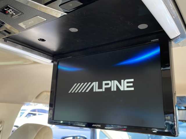 トヨタ アルファードハイブリット G 道東・釧路十勝 2015(平27)年 8.7万km ブラック １０型アルパインナビ　フリップダウンモニター　ＣＤ／ＤＶＤ再生　Ｂｌｕｅｔｏｏｔｈ　フルセグ　バッグカメラ　両側パワースライドドア　クルコン　ドラレコ　ＥＴＣ　純正１７インチＡＷ　ＬＥＤヘッドライト