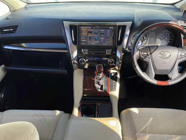 トヨタ アルファードハイブリット G 道東・釧路十勝 2015(平27)年 8.7万km ブラック １０型アルパインナビ　フリップダウンモニター　ＣＤ／ＤＶＤ再生　Ｂｌｕｅｔｏｏｔｈ　フルセグ　バッグカメラ　両側パワースライドドア　クルコン　ドラレコ　ＥＴＣ　純正１７インチＡＷ　ＬＥＤヘッドライト