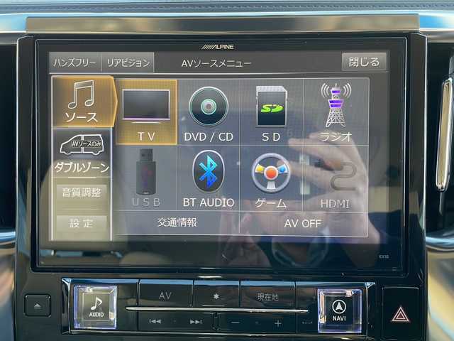 トヨタ アルファードハイブリット G 道東・釧路十勝 2015(平27)年 8.7万km ブラック １０型アルパインナビ　フリップダウンモニター　ＣＤ／ＤＶＤ再生　Ｂｌｕｅｔｏｏｔｈ　フルセグ　バッグカメラ　両側パワースライドドア　クルコン　ドラレコ　ＥＴＣ　純正１７インチＡＷ　ＬＥＤヘッドライト