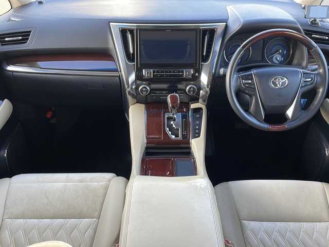 トヨタ アルファードハイブリット G 道東・釧路十勝 2015(平27)年 8.7万km ブラック ・４WD/・ALPINE１０インチナビ/（ＣＤ・ＤＶＤ・Ｂｌｕｅｔｏｏｔｈ・フルセグ・ラジオ）/・ALPINEフリップダウンモニター/・バッグカメラ　/・両側パワースライドドア/・クルーズコントロール　/・ドライブレコーダー/・ＥＴＣ/・ハーフレザーシート/・助手席オットマン/・セカンドシートオットマン/・純正１７インチアルミホイール　/・ＬＥＤヘッドライト