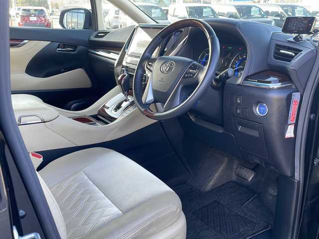 トヨタ アルファードハイブリット G 道東・釧路十勝 2015(平27)年 8.7万km ブラック ・４WD/・ALPINE１０インチナビ/（ＣＤ・ＤＶＤ・Ｂｌｕｅｔｏｏｔｈ・フルセグ・ラジオ）/・ALPINEフリップダウンモニター/・バッグカメラ　/・両側パワースライドドア/・クルーズコントロール　/・ドライブレコーダー/・ＥＴＣ/・ハーフレザーシート/・助手席オットマン/・セカンドシートオットマン/・純正１７インチアルミホイール　/・ＬＥＤヘッドライト