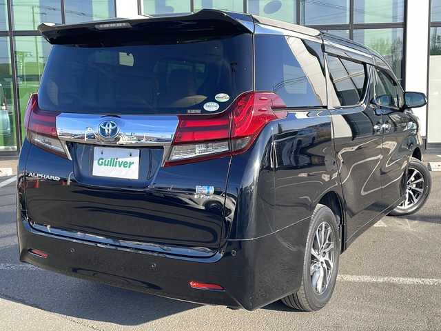 トヨタ アルファードハイブリット G 道東・釧路十勝 2015(平27)年 8.7万km ブラック ・４WD/・ALPINE１０インチナビ/（ＣＤ・ＤＶＤ・Ｂｌｕｅｔｏｏｔｈ・フルセグ・ラジオ）/・ALPINEフリップダウンモニター/・バッグカメラ　/・両側パワースライドドア/・クルーズコントロール　/・ドライブレコーダー/・ＥＴＣ/・ハーフレザーシート/・助手席オットマン/・セカンドシートオットマン/・純正１７インチアルミホイール　/・ＬＥＤヘッドライト