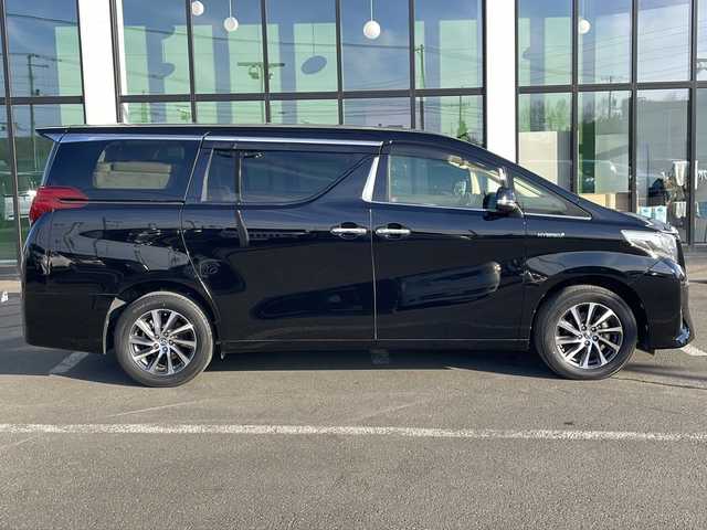 トヨタ アルファードハイブリット G 道東・釧路十勝 2015(平27)年 8.7万km ブラック ・４WD/・ALPINE１０インチナビ/（ＣＤ・ＤＶＤ・Ｂｌｕｅｔｏｏｔｈ・フルセグ・ラジオ）/・ALPINEフリップダウンモニター/・バッグカメラ　/・両側パワースライドドア/・クルーズコントロール　/・ドライブレコーダー/・ＥＴＣ/・ハーフレザーシート/・助手席オットマン/・セカンドシートオットマン/・純正１７インチアルミホイール　/・ＬＥＤヘッドライト