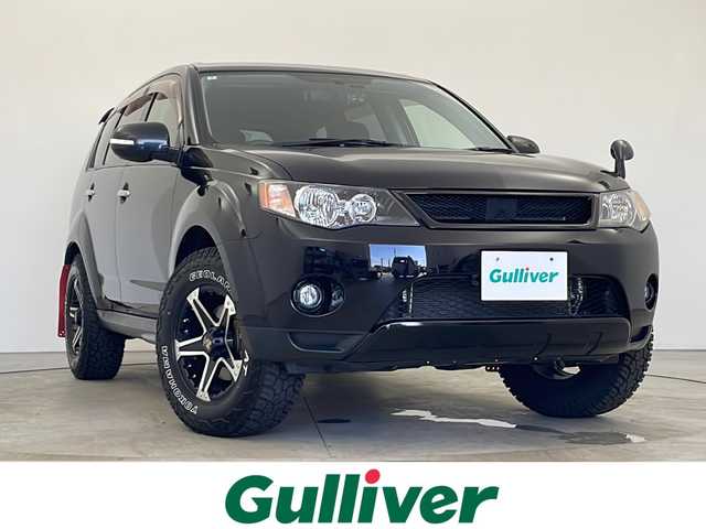 三菱 アウトランダー 24G 秋田県 2012(平24)年 6.7万km アメジストブラック 4WD /社外ナビ(Bluetooth フルセグTV AM/FM） /ETC /オートライト /電動格納ミラー /純正フロアマット /ドアバイザー /本革巻ステアリング　/横滑り防止装置