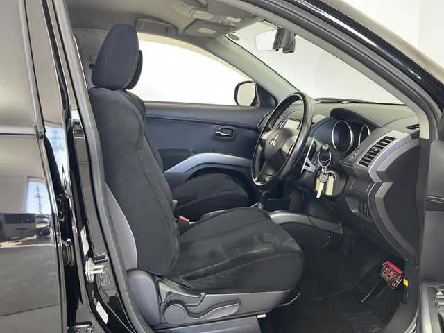 三菱 アウトランダー 24G 秋田県 2012(平24)年 6.7万km アメジストブラック 4WD /社外ナビ(Bluetooth フルセグTV AM/FM） /ETC /オートライト /電動格納ミラー /純正フロアマット /ドアバイザー /本革巻ステアリング　/横滑り防止装置