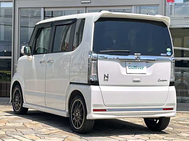 ホンダ Ｎ ＢＯＸ カスタム ターボ SSブラックSパッケージ 静岡県 2017(平29)年 6.5万km プレミアムホワイトパールⅡ 社外ナビ/・フルセグＴＶ/・CD/DVD/Bluetooth/MSV/ラジオ/主要装備/・バックカメラ/・ＥＴＣ/・シートヒーター/・両側パワースライドドア/・ハーフレザーシート/・クルーズコントロール/・ＨＩＤヘッドライト/・あんしんパッケージ/・プッシュスタート/・スマートキー