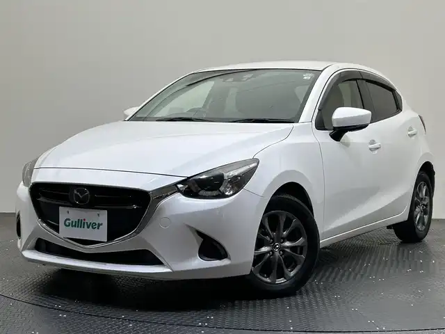 マツダ デミオ 13S ツーリング 愛媛県 2017(平29)年 4万km スノーフレイクホワイトパールマイカ 純正SDナビ/(Bluetooth/フルセグ)/バックカメラ/レーダークルーズコントロール/衝突被害軽減ブレーキ/レーンキープアシスト/コーナーセンサー/シートヒーター/ヘッドアップディスプレイ/ブラインドスポットモニター/ETC/ドアバイザー/オートマチックハイビーム/オートライト/プッシュスタート