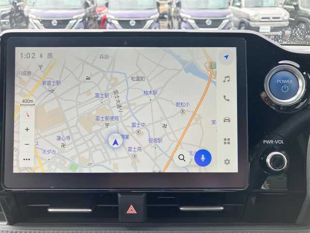 トヨタ ヴォクシー ハイブリッド S－Z 静岡県 2023(令5)年 1.7万km グリッターブラックガラスフレーク エンジンスタートボタン/保証書/取扱説明書/パワーステアリング/パワーウィンドウ/100V充電/アイドリングストップ/スマートキー/スペアキー/Wオートエアコン/クルーズコントロール/ETC2.0/USB入力端子/バックカメラ/純正10.5インチナビ（CD/DVD/BT/フルセグ）/三列シート/ウォークスルー/フロアマット/ハーフレザーシート/D席N席シートヒーター/両側パワースライドドア/純正アルミホイール/ABS/横滑り防止装置/コーナーセンサー前後/オートライト/オートマチックハイビーム/LEDヘッドライト/W＋サイドエアバック/衝突軽減システム