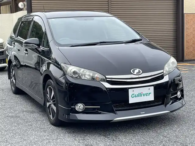 トヨタ ウィッシュ 1．8S モノトーン 千葉県 2015(平27)年 3万km ブラック メーカーナビ　【フルセグTV、Bluetooth、AMFMラジオ、CD】/16インチ純正アルミホイール/純正フロアマット/パドルシフト/全席ハーフレザーシート/全席パワーウィンドウ/ウィンカーミラー/電動格納ミラー/オートフロントライト/プッシュスタート/走行モード切替【エコモー/ドアバイザー/横滑り防止機能ド、パワーモード】/ビルドインETC/nanoe空調