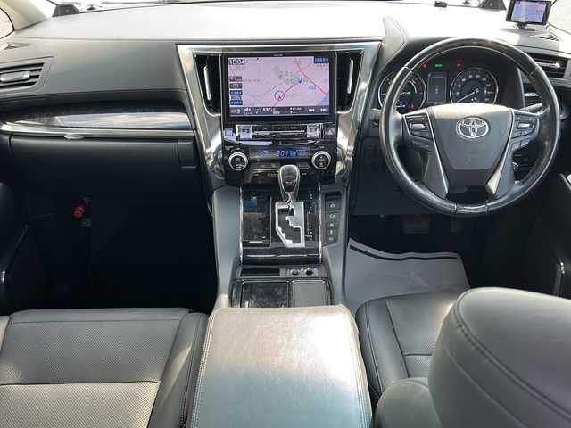 トヨタ アルファードハイブリット SR Cパッケージ 岐阜県 2020(令2)年 3.9万km ホワイトパールクリスタルシャイン 登録時走行距離38173km/純正１１型ナビ/フルセグＴＶ/バック＋サイドカメラ/サンルーフ(ダブルルーフ)/両側パワースライドドア/後席モニター(RXH12X-L)12.8型/プリクラッシュセーフティ/前後コーナーセンサー/２眼ＬＥＤヘッドライト/フォグランプ/ドライブレコーダー/４ＷＤ/スマートキー/プッシュスタート/レザーシート/パワーシート前席+2列目シート/シートヒーター前席/エアシート前席/ステアリングヒーター/HDMI/レーダー探知機/オットマン(助手席＋2列目シート)/純正17インチアルミホイール/補助ミラー