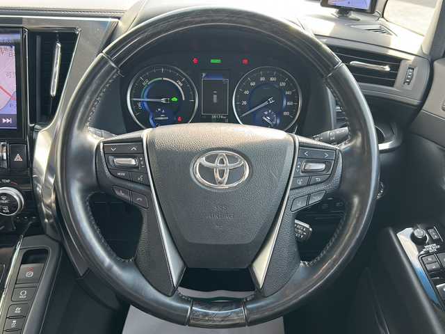 トヨタ アルファードハイブリット SR Cパッケージ 岐阜県 2020(令2)年 3.9万km ホワイトパールクリスタルシャイン 登録時走行距離38173km/純正１１型ナビ/フルセグＴＶ/バック＋サイドカメラ/サンルーフ(ダブルルーフ)/両側パワースライドドア/後席モニター(RXH12X-L)12.8型/プリクラッシュセーフティ/前後コーナーセンサー/２眼ＬＥＤヘッドライト/フォグランプ/ドライブレコーダー/４ＷＤ/スマートキー/プッシュスタート/レザーシート/パワーシート前席+2列目シート/シートヒーター前席/エアシート前席/ステアリングヒーター/HDMI/レーダー探知機/オットマン(助手席＋2列目シート)/純正17インチアルミホイール/補助ミラー