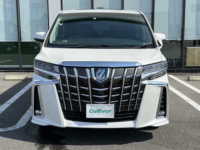 トヨタ アルファードハイブリット SR Cパッケージ 岐阜県 2020(令2)年 3.9万km ホワイトパールクリスタルシャイン 登録時走行距離38173km/純正１１型ナビ/フルセグＴＶ/バック＋サイドカメラ/サンルーフ(ダブルルーフ)/両側パワースライドドア/後席モニター(RXH12X-L)12.8型/プリクラッシュセーフティ/前後コーナーセンサー/２眼ＬＥＤヘッドライト/フォグランプ/ドライブレコーダー/４ＷＤ/スマートキー/プッシュスタート/レザーシート/パワーシート前席+2列目シート/シートヒーター前席/エアシート前席/ステアリングヒーター/HDMI/レーダー探知機/オットマン(助手席＋2列目シート)/純正17インチアルミホイール/補助ミラー