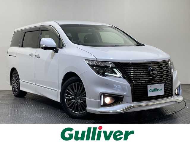 日産 エルグランド 250HWS S アーバンクロム 愛媛県 2021(令3)年 1.7万km ピュアホワイトパール １０型ナビ/フルセグ／Ｂｌｕｅｔｏｏｔｈ／ＣＤ／ＤＶＤ／ＵＳＢ/全方位カメラ/衝突軽減ブレーキ/ＥＴＣ/前後ドライブレコーダー/レーダークルーズコントロール/両側パワースライドドア/レーンキープアシスト/オットマン/ハーフレザーシート/LEDヘッドライト/前後コーナーセンサー