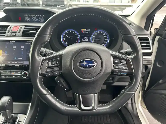 スバル レヴォーグ 1．6GT アイサイト 道北・旭川 2017(平29)年 8.6万km クリスタルホワイトP (株)IDOMが運営する【じしゃロン旭川店】の自社ローン専用車両になります。こちらは現金またはオートローンご利用時の価格です。自社ローンご希望の方は別途その旨お申付け下さい/　/・純正ナビ(CD/DVD/BT/SD/フルセグ)/・バックカメラ/・ETC/・アイサイト/・クルーズコントロール/・ステアリングリモコン/・両席パワーシート/・両席シートヒーター/・電動格納ウィンカーミラー/・プッシュスタート/・スマートキー1個/・フォグランプ/・現車装着スタッドレスタイヤ 純正AW215/50R17/・取扱説明書