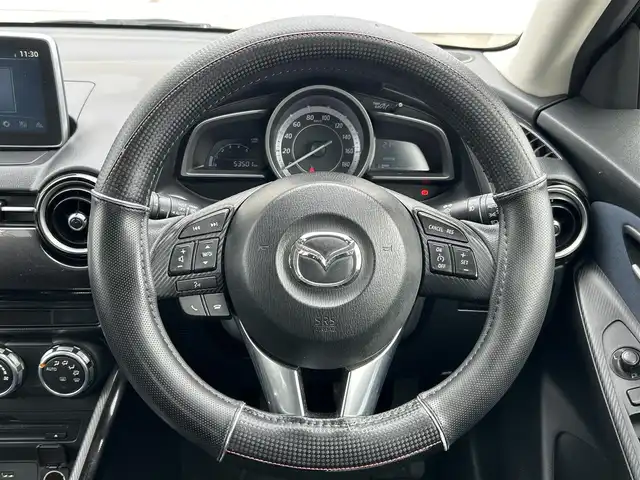 マツダ デミオ XD 滋賀県 2015(平27)年 5.4万km ディープクリスタルブルーマイカ ディーゼル/2WD(FF)/6速MT/7インチ純正ナビ/（FM/AM/CD/DVD/フルセグ/Bluetooth）/ETC/ドライブレコーダー/バックカメラ/プリクラッシュブレーキアシスト	/クルーズコントロール/レーンキープアシスト	/電動格納ミラー/アイドリングストップ/ステアリングスイッチ/オートライト/LEDヘッドライト/フロントフォグ/フルオートエアコン/プッシュスタート/スマートキー/純正フロアマット/ドアバイザー