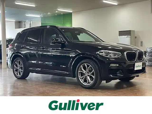 ＢＭＷ Ｘ３ xDrive20d Mスポーツ 道央・札幌 2018(平30)年 8.8万km サファイアブラックP 4WD/ディーゼル車/純正ナビ/・フルセグTV/CD/DVD/BT/USB/MS/フロント、サイド、バックカメラ/全周囲カメラ/本革シート/前席パワーシート/前席シートベンチレーション/全席シートヒーター/運転席シートメモリ機能/パワーバックドア/オートクルーズコントロール/ミラー一体型ETC/衝突被害軽減ブレーキ/レーンキープアシスト/横滑り防止装置/前後コーナーセンサー/ワイヤレス充電/電動パーキングブレーキ/ブレーキホールド/ヘッドアップディスプレイ/ブラインドスポットモニター/アイドリングストップ/パドルシフト/ウインカーミラー/社外ドライブレコーダー/フロアマット/ステアリングリモコン/オートライト/オートハイビーム/LEDヘッドライト/前後フォグライト/プッシュスタート/スマートキーx2/アンビエントライト/ルーフレール/トノカバー/純正19インチAW/新車時保証書/取扱説明書
