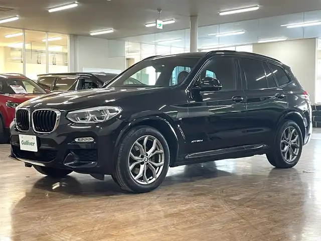 ＢＭＷ Ｘ３ xDrive20d Mスポーツ 道央・札幌 2018(平30)年 8.8万km サファイアブラックP 4WD/ディーゼル車/純正ナビ/・フルセグTV/CD/DVD/BT/USB/MS/フロント、サイド、バックカメラ/全周囲カメラ/本革シート/前席パワーシート/前席シートベンチレーション/全席シートヒーター/運転席シートメモリ機能/パワーバックドア/オートクルーズコントロール/ミラー一体型ETC/衝突被害軽減ブレーキ/レーンキープアシスト/横滑り防止装置/前後コーナーセンサー/ワイヤレス充電/電動パーキングブレーキ/ブレーキホールド/ヘッドアップディスプレイ/ブラインドスポットモニター/アイドリングストップ/パドルシフト/ウインカーミラー/社外ドライブレコーダー/フロアマット/ステアリングリモコン/オートライト/オートハイビーム/LEDヘッドライト/前後フォグライト/プッシュスタート/スマートキーx2/アンビエントライト/ルーフレール/トノカバー/純正19インチAW/新車時保証書/取扱説明書