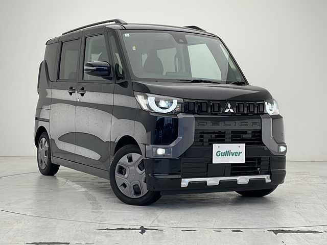 三菱 デリカミニ G 沖縄県 2024(令6)年 0.3万km アメジストブラック ワンオーナー/純正9インチナビ（MM23DーL）/BT/SD/フルセグ/AM/FM/バックカメラ/両側電動スライドドア/ルーフレール/アイドリングストップ/衝突軽減装置/オートライト/オートエアコン/クリアランスソナー/スマートキー/プッシュスタート/純正フロアマット/保証書