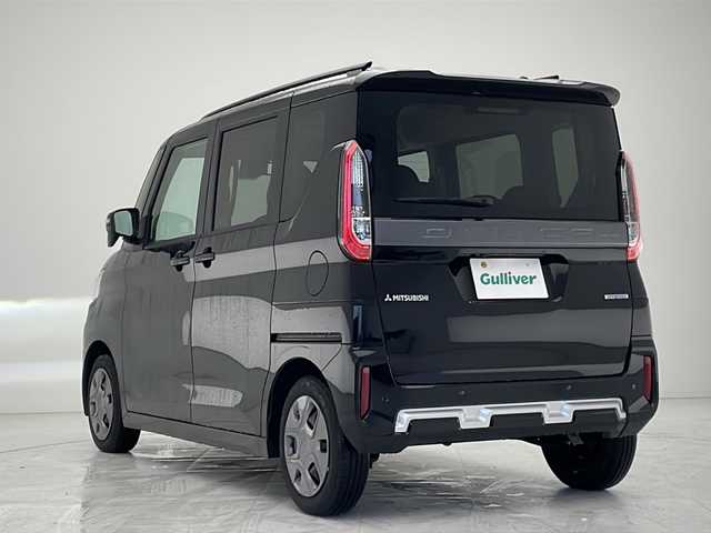 三菱 デリカミニ G 沖縄県 2024(令6)年 0.3万km アメジストブラック ワンオーナー/純正9インチナビ（MM23DーL）/BT/SD/フルセグ/AM/FM/バックカメラ/両側電動スライドドア/ルーフレール/アイドリングストップ/衝突軽減装置/オートライト/オートエアコン/クリアランスソナー/スマートキー/プッシュスタート/純正フロアマット/保証書