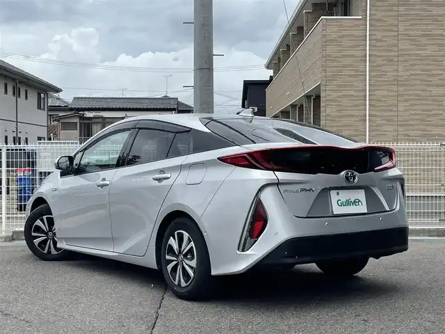 トヨタ プリウス ＰＨＶ A レザーパッケージ 福島県 2017(平29)年 2.1万km シルバーM ワンオーナー/Toyota Safety Sense P/11.6インチT‐Connectナビ/AM/FM/BT/USB/フルセグTV/純正15インチAW(社外AW＋冬タイヤ積込)/黒レザーシート/レーダークルーズコントロール/プリクラッシュセーフティ/ブラインドスポットモニター/バックカメラ/シートヒーター/パワーシート/ステアリングヒーター/ステアリングリモコン/オートハイビーム/LEDヘッドライト/フォグ/リアフォグ/純正ドライブレコーダー/ビルトインETC 2.0/プッシュスタート/ドアバイザー/フロアマット