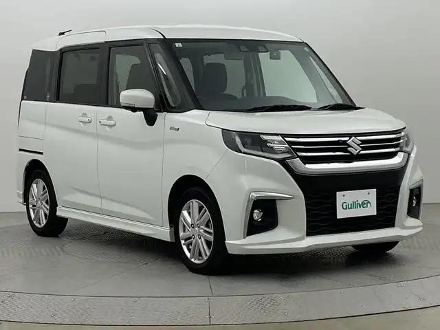 スズキ ソリオ HV MZ 新潟県 2021(令3)年 2.1万km ピュアホワイトP スズキセーフティサポート/禁煙車/ワンオーナー/純正9インチメモリナビ/　　CD/DVD/AM/FM/BT/フルセグ//　　applecarplay/androidauto/アラウンドビューモニター/両側パワースライドドア/アダプティブクルーズコントロール/LEDオートライト/前席シートヒーター/純正15インチアルミホイール付/ステアリングスイッチ/サーキュレーター/アイドリングストップ/ヘッドアップディスプレイ/USBポート/社外ドライブレコーダー/後席パーソナルテーブル/後席ロールサンシェード/スペアキー/スマートキー/ETC