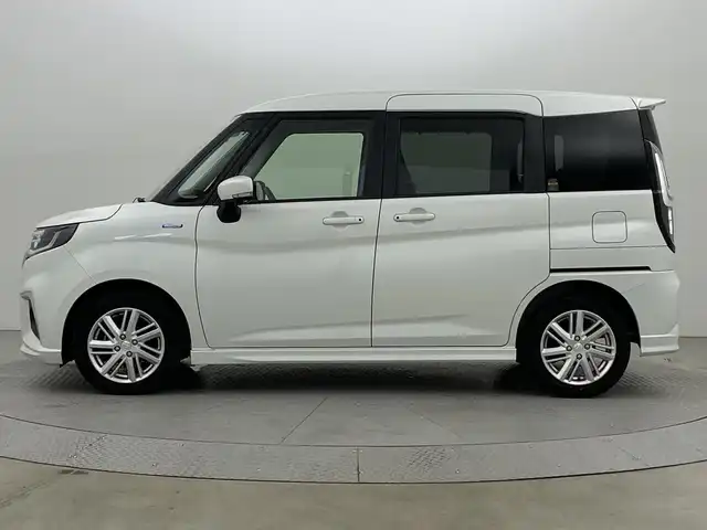 スズキ ソリオ HV MZ 新潟県 2021(令3)年 2.1万km ピュアホワイトP スズキセーフティサポート/禁煙車/ワンオーナー/純正9インチメモリナビ/　　CD/DVD/AM/FM/BT/フルセグ//　　applecarplay/androidauto/アラウンドビューモニター/両側パワースライドドア/アダプティブクルーズコントロール/LEDオートライト/前席シートヒーター/純正15インチアルミホイール付/ステアリングスイッチ/サーキュレーター/アイドリングストップ/ヘッドアップディスプレイ/USBポート/社外ドライブレコーダー/後席パーソナルテーブル/後席ロールサンシェード/スペアキー/スマートキー/ETC