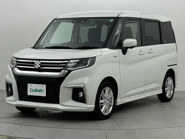 スズキ ソリオ HV MZ 新潟県 2021(令3)年 2.1万km ピュアホワイトP スズキセーフティサポート/禁煙車/ワンオーナー/純正9インチメモリナビ/　　CD/DVD/AM/FM/BT/フルセグ//　　applecarplay/androidauto/アラウンドビューモニター/両側パワースライドドア/アダプティブクルーズコントロール/LEDオートライト/前席シートヒーター/純正15インチアルミホイール付/ステアリングスイッチ/サーキュレーター/アイドリングストップ/ヘッドアップディスプレイ/USBポート/社外ドライブレコーダー/後席パーソナルテーブル/後席ロールサンシェード/スペアキー/スマートキー/ETC