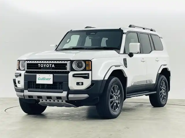 トヨタ ランドクルーザー ２５０ VX 福島県 2024(令6)年 0.5万km プラチナホワイトパールマイカ サンルーフ/丸目ライト/モデリスタ/・フロントバンパーガード/・フロントアンダーカバー/・シグネチャーイルミブレード/・オーバーフェンダー/・フェンダーガーニッシュ/・サイドモール/・リヤバンパーガーニッシュ/・リヤバンパーステップガード/・リヤスポイラー/アドバンスドドライブ/・FCTA/LCA/・ドライバーモニターカメラ/トヨタセーフティセンス/・PCS/LDA/PDA/BSM/・RCTA/RCD/RSA/PKSB/・レーダークルーズコントロール/・後方車接近告知/・安心降車サポート/・周辺車両接近時サポート/・クリアランスソナー/純正12.3型ディスプレイ/・フルセグTV/ナビ/BT/USB/HDMI/・全方位カメラ/・ドライブレコーダー/・ETC2.0/・デジタルインナーミラー/パワーバックドア/ルーフレール/サイドステップ/電子パーキング/・オートホールド/革巻きステアリング/・ステアリングリモコン/・ステアリングヒーター/レザーシート/・Dパワーシート/・D/Nシートヒーター/・D/Nエアシート/プッシュスタート/・スマートキー×2/LEDヘッドライト/・オートライト/・フォグ/・オートハイビーム/ワンオーナー