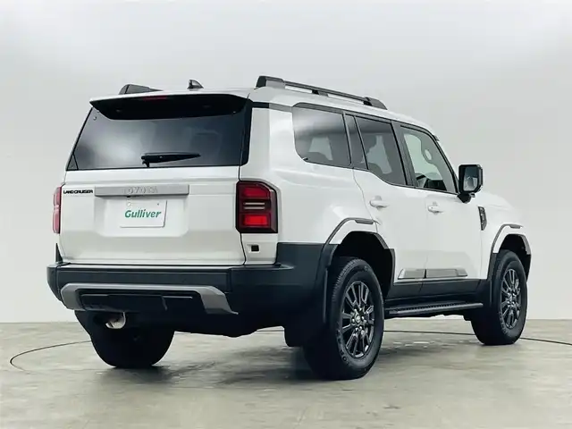 トヨタ ランドクルーザー ２５０ VX 福島県 2024(令6)年 0.5万km プラチナホワイトパールマイカ サンルーフ/丸目ライト/モデリスタ/・フロントバンパーガード/・フロントアンダーカバー/・シグネチャーイルミブレード/・オーバーフェンダー/・フェンダーガーニッシュ/・サイドモール/・リヤバンパーガーニッシュ/・リヤバンパーステップガード/・リヤスポイラー/アドバンスドドライブ/・FCTA/LCA/・ドライバーモニターカメラ/トヨタセーフティセンス/・PCS/LDA/PDA/BSM/・RCTA/RCD/RSA/PKSB/・レーダークルーズコントロール/・後方車接近告知/・安心降車サポート/・周辺車両接近時サポート/・クリアランスソナー/純正12.3型ディスプレイ/・フルセグTV/ナビ/BT/USB/HDMI/・全方位カメラ/・ドライブレコーダー/・ETC2.0/・デジタルインナーミラー/パワーバックドア/ルーフレール/サイドステップ/電子パーキング/・オートホールド/革巻きステアリング/・ステアリングリモコン/・ステアリングヒーター/レザーシート/・Dパワーシート/・D/Nシートヒーター/・D/Nエアシート/プッシュスタート/・スマートキー×2/LEDヘッドライト/・オートライト/・フォグ/・オートハイビーム/ワンオーナー
